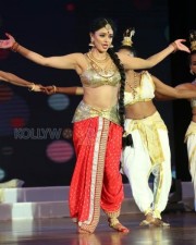 Pooja Kumar Dance Performance At Uttama Villain Audio Launch Photos