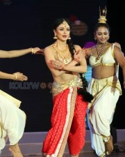 Pooja Kumar Dance Performance At Uttama Villain Audio Launch Photos