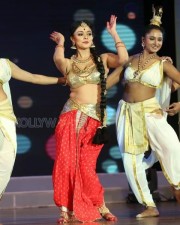 Pooja Kumar Dance Performance At Uttama Villain Audio Launch Photos