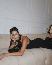 Sexy Radhika Seth in a Black Sleeveless Ruffles Maxi Dress Photos 04