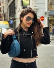 Stylish Mehreen Pirzada in a Black Biker Jacket with a Matching Black Pant and Blue Handbag Photos 04