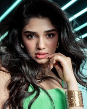 Adorable Krithi Shetty in a Green Sleeveless Dress Pictures 01