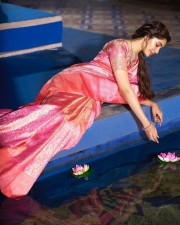 Captivating Krithi Shetty in a Pink Saree Photos 03