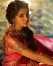 Captivating Krithi Shetty in a Pink Saree Photos 04