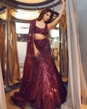 Dazzling Krithi Shetty in a Maroon Designer Lehenga Choli Photos 01