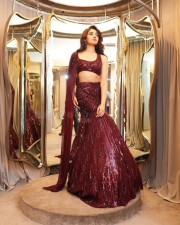 Dazzling Krithi Shetty in a Maroon Designer Lehenga Choli Photos 06