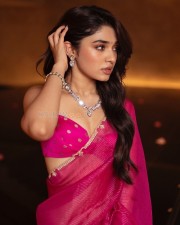 Glam Krithi Shetty in a Pink Saree with Matching Pink Sleeveless Blouse Photos 03