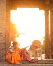 Gorgeous Janani Iyer in an Orange Silk Saree Photos 04