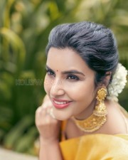 Gorgeous Priya Anand in a Traditional Silk Saree with Half Blouse Photos 02