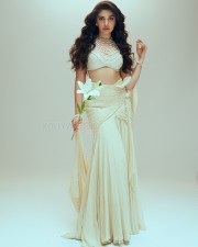 Gorgeous Tollywood Actress Krithi Shetty in an Pearl adorned Stylish Crop Top with a Designer Lehenga Photos 02