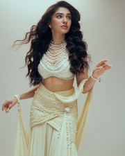 Gorgeous Tollywood Actress Krithi Shetty in an Pearl adorned Stylish Crop Top with a Designer Lehenga Photos 07