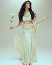 Gorgeous Tollywood Actress Krithi Shetty in an Pearl adorned Stylish Crop Top with a Designer Lehenga Photos 10