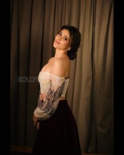 Sensuous Priyanka Jawalkar in a White Off Shoulder Top and Black Skirt Pictures 02