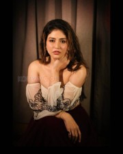 Sensuous Priyanka Jawalkar in a White Off Shoulder Top and Black Skirt Pictures 08