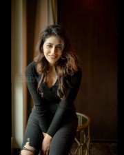 Stunning Priyanka Jawalkar in a Black Ribbed Top with Matching Jeans Photos 01