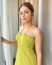 Adorable Shraddha Das in a Strappy Halterneck Yellow Dress Pictures 02