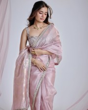 Beautiful and Cute Ashika Ranganath in a Pink Transparent Saree Photos 01