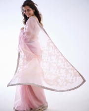 Beautiful and Cute Ashika Ranganath in a Pink Transparent Saree Photos 06