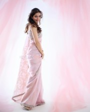 Beautiful and Cute Ashika Ranganath in a Pink Transparent Saree Photos 08