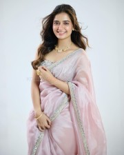 Beautiful and Cute Ashika Ranganath in a Pink Transparent Saree Photos 11