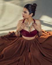 Enchanting Shraddha Das in a Sultry Wine Corset and Pleated Skirt Pictures 01