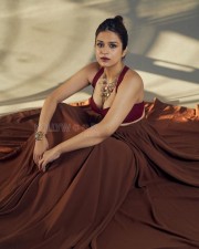 Enchanting Shraddha Das in a Sultry Wine Corset and Pleated Skirt Pictures 02