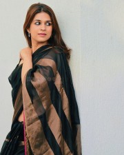 Hot Shraddha Das in a Black Silk Saree Photos 01