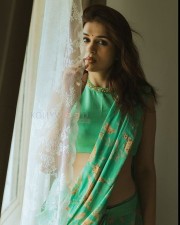 Sensuous and Sizzling Shraddha Das in a Green Saree with a Sleeveless Blouse Pictures 03