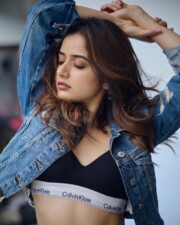 Sexy Ashika Ranganath in a Denim Jacket with Calvin Klein Sports Bra Photos 01