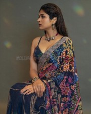 Stunning Actress Shraddha Das in a Blue Printed Saree with Sleeveless Deep Neck Blouse Photos 01