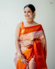 Traditional Beauty Ashika Ranganath in an Orange Silk Saree Pictures 01