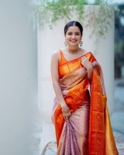 Traditional Beauty Ashika Ranganath in an Orange Silk Saree Pictures 03