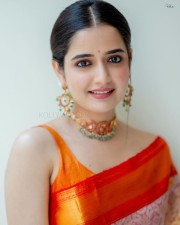 Traditional Beauty Ashika Ranganath in an Orange Silk Saree Pictures 04