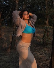 Glamour Beauty Ketika Sharma in a Blue Bralette and Beige Skirt Photos 02