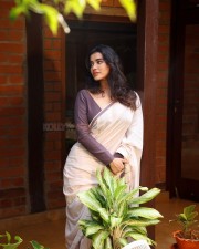 Stunning Ketika Sharma in a White Saree with Full Sleeve Blouse Photos 05