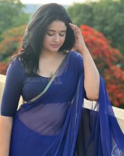 Captivating Poonam Bajwa Cleavage in a Blue Saree with Matching Blouse Photos 02