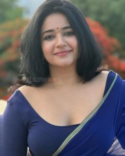 Captivating Poonam Bajwa Cleavage in a Blue Saree with Matching Blouse Photos 03