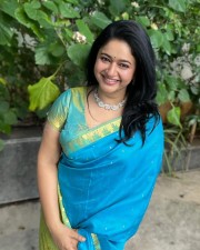 Pathonpatham Noottandu Actress Poonam Bajwa in a Cyan Blue Silk Saree Photos 01