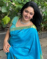 Pathonpatham Noottandu Actress Poonam Bajwa in a Cyan Blue Silk Saree Photos 04