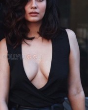 Hot Shreya Dhanwanthary Boobs Cleavage in a Deep Plunge Black Top Photo 01