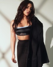 Sultry Samyuktha Menon in a Stylish Black Bralette and Matching Skirt with a Black Jacket Photos 05