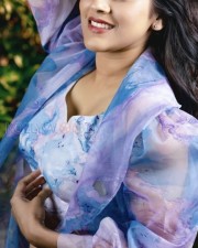 Stylish Rashmi Gautam in a Light Purple Top with a Floral Coat and Shimmery Midi Skirt Photos 03