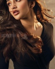 Charming Heroine Sreeleela in Black Full Sleeve Top and Torn Jeans Photos 07