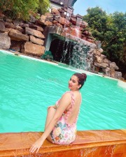 Sexy Eshanya Maheshwari in an One Piece Swimsuit Pool Photos 01