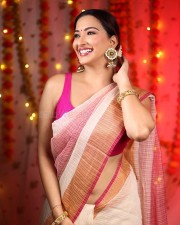 Stunning Eshanya Maheshwari in a White and Pink Saree with a Sleeveless Pink Blouse Photos 02