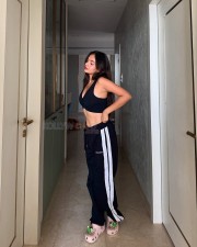 Curvaceous Anushka Sen in a Black Sporty Sleeveless Crop Top with Matching Bottom Track Pant Photos 03