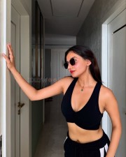 Curvaceous Anushka Sen in a Black Sporty Sleeveless Crop Top with Matching Bottom Track Pant Photos 04