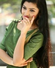 Actress Akshita Green Dress Photos 03