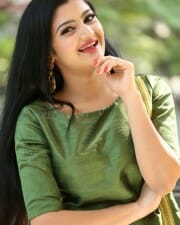 Actress Akshita Green Dress Photos 04