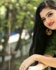 Actress Akshita Green Dress Photos 06